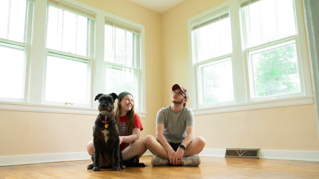 andrew-mead-r_X4YHAlBPo-unsplash | Home Alarms Canada Family moving into their new home